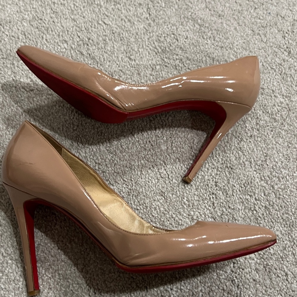 Christian Louboutins Elegant Nude Pumps with Red Soles 100 mm Authentic